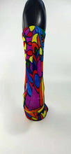 Load image into Gallery viewer, Bamboo sock with a stylistic face of a woman in green, red, blue, yellow, and orange.