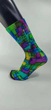 Load image into Gallery viewer, Abstract bamboo sock in purple, blue, yellow, and green geometrical designs.