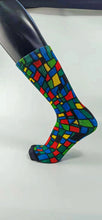 Load image into Gallery viewer, Checkered designed bamboo socks in a red, blue, green, and yellow rectangle and square mosaic.