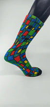 Load image into Gallery viewer, Checkered designed bamboo socks in a red, blue, green, and yellow rectangle and square mosaic.