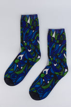 Load image into Gallery viewer, A bamboo sock with blue, green, and black intertwining shapes.